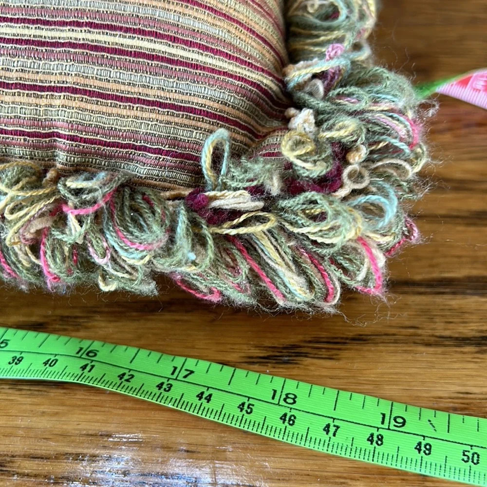 Striped gold/wine accent pillow with fringe.  Size is 14” x 18”